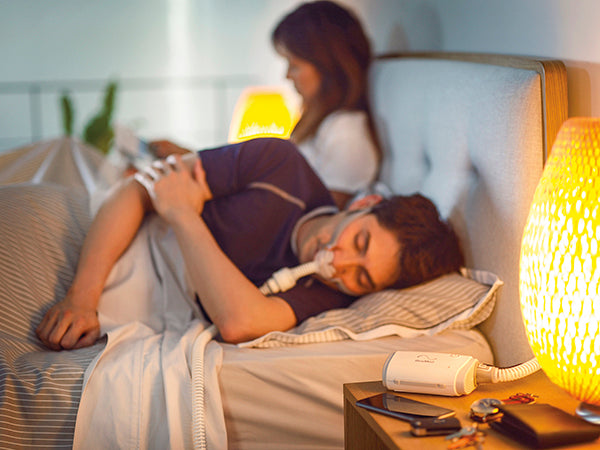 A man sleeping with Resmed