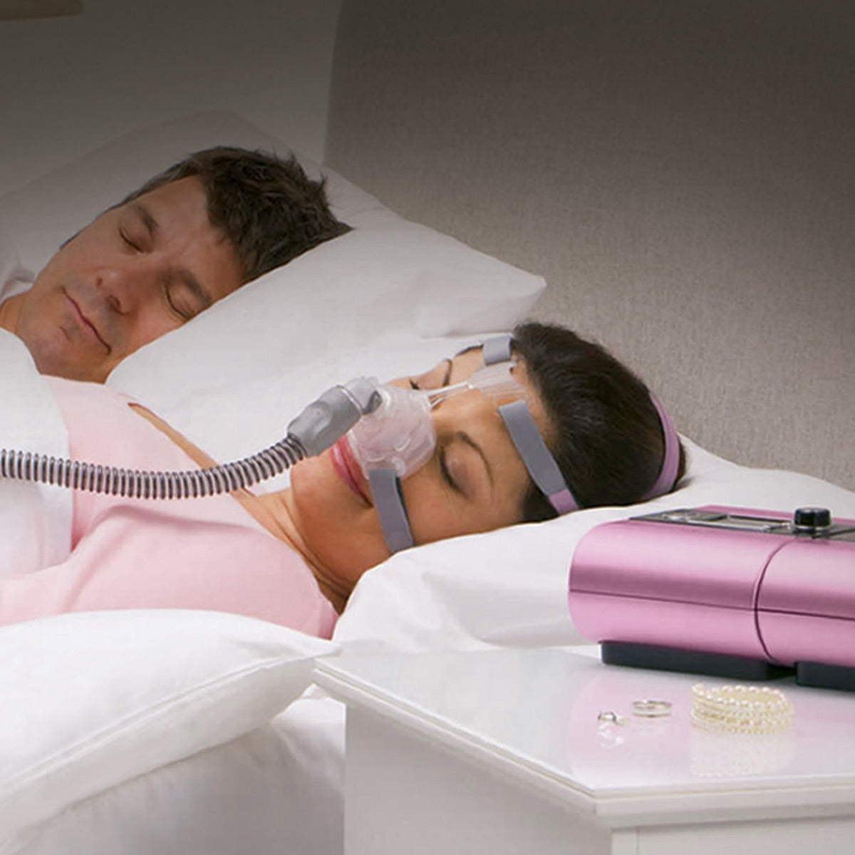A woman using a cpap machine