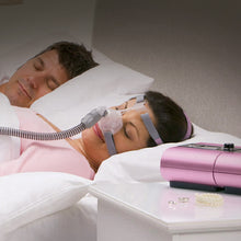Load image into Gallery viewer, A woman using a cpap machine