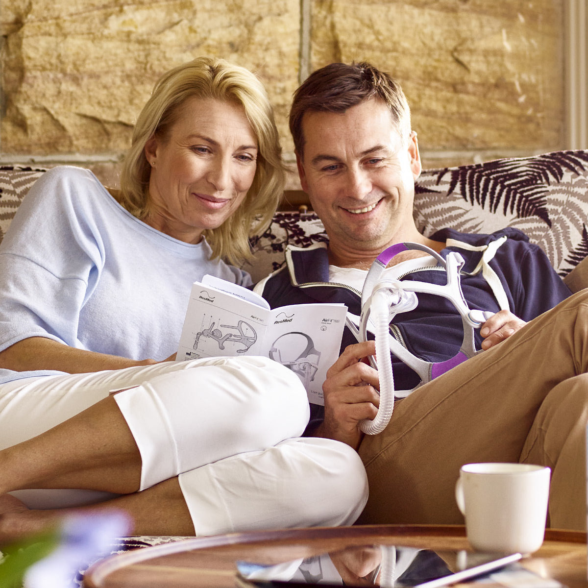 a couple looking at the new airfit n20 nasal cpap mask